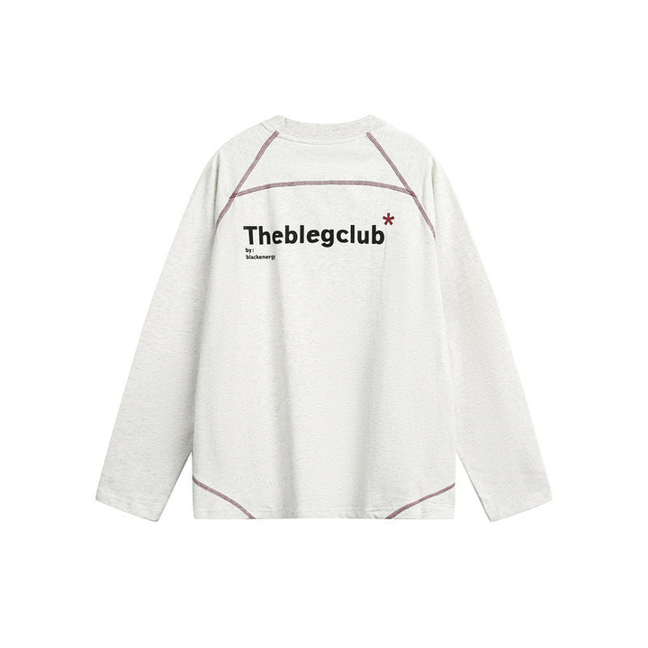 Unisex Relaxed‑Fit Langarmshirt mit Rundhalsausschnitt, kontrastierenden Flatlocknähten und weichem Loopback-Finish Drune