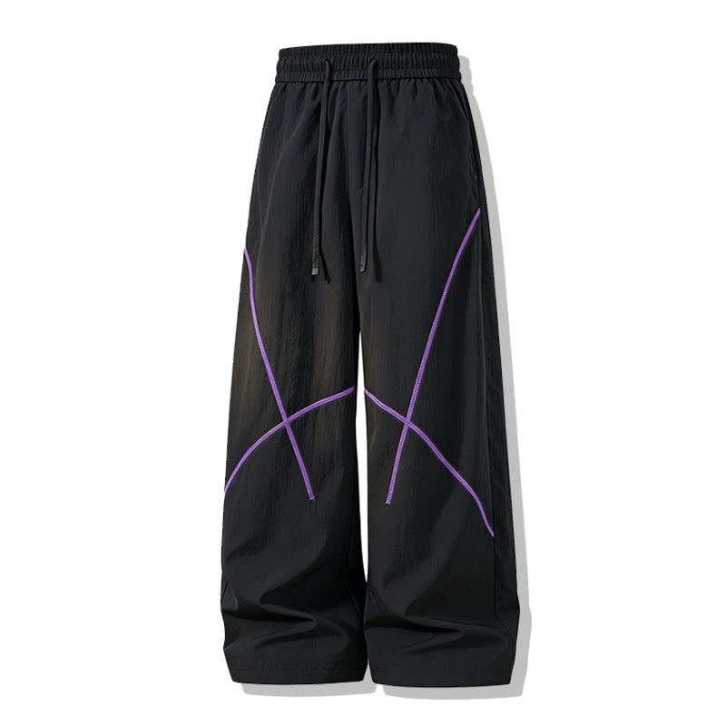 Herren Weite Funktions-Nylonhose mit Kordelbund, reflektierenden Nahtdetails & lässiger Baggy‑Silhouette Drune