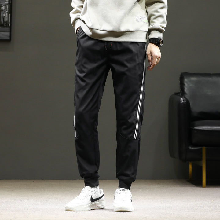Herren Sportliche Nylon-Joggerhose mit elastischem Bund und seitlichen Kontraststreifen Drune
