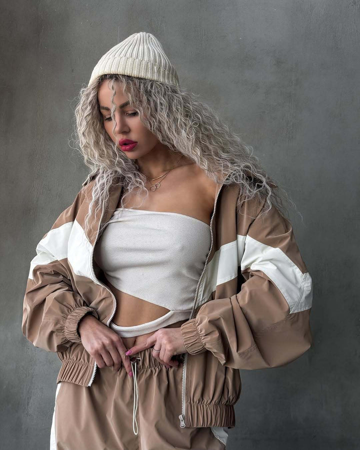 Damen leichte Oversize-Windbreakerjacke mit Kontrastpanelen, Tunnelzugbund und elastischen Bündchen Drune