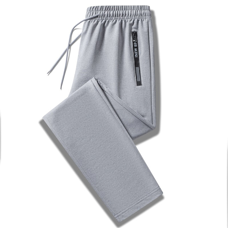 Herren Sportliche Trainingshose mit elastischem Tunnelzugbund, Reißverschlusstasche und glattem Performance‑Material Drune