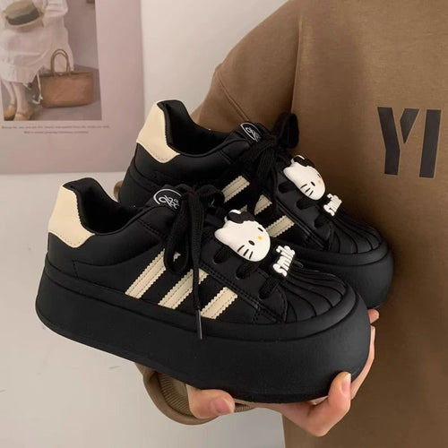 Damen Plateau Sneakers mit verspielten Hello Kitty Applikationen Drune