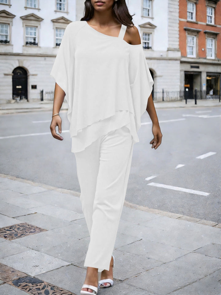 Damen Lagenbluse mit One-Shoulder-Trägern und asymmetrischem Volant-Saum Drune