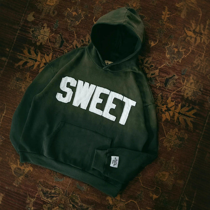 Unisex nan weit geschnittener Kapuzenpullover mit aufgesetzten Buchstabenapplikationen und Kängurutasche Drune