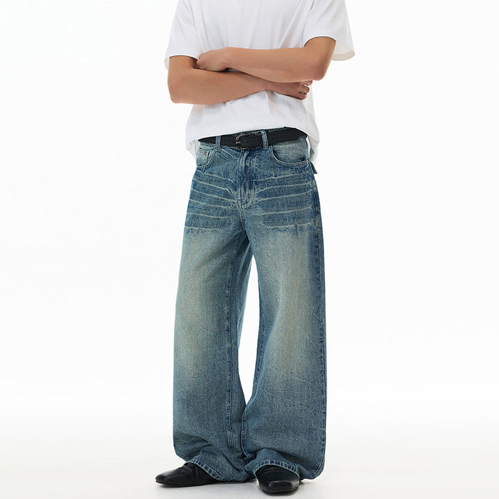 Herren Ultraweit geschnittene Denim-Baggy-Jeans mit markanten Whisker-Akzenten und bodenlangem Saum Drune