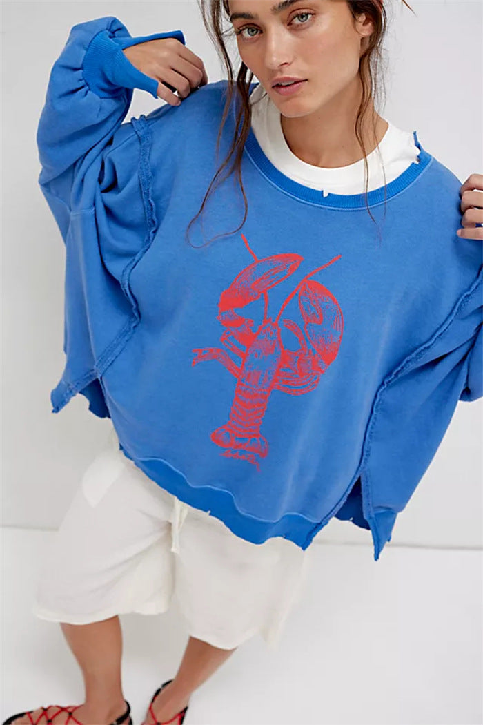 Damen oversized Sweatshirt mit Rüben-Print, ausgefransten Nahtakzenten und Daumenlochärmeln Drune