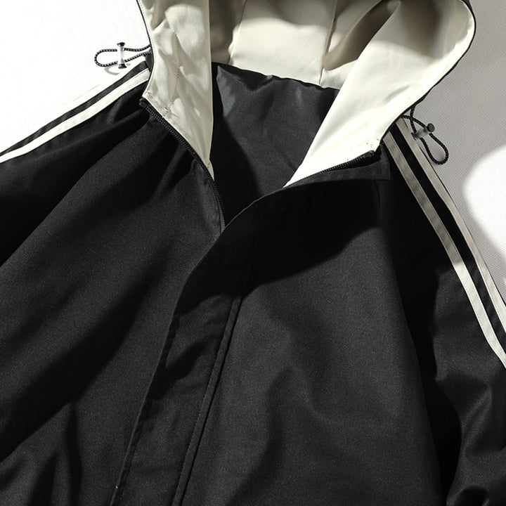 Herren Sportliche Outdoor‑Shelljacke mit Kapuze, reflektierenden Ärmestreifen und Reißverschlusstaschen Drune
