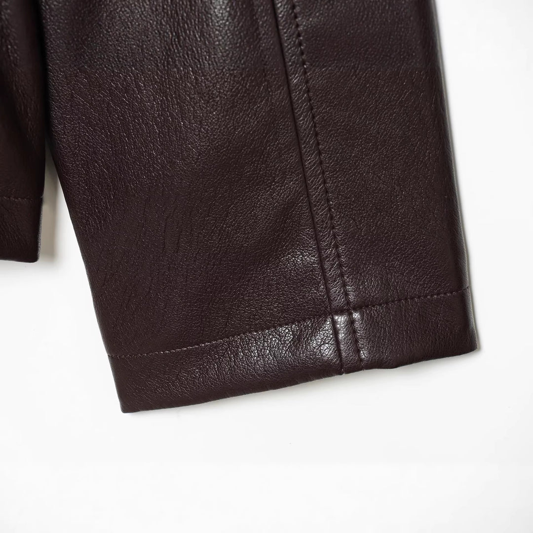 Damen Kurzjacke in veganer Lederoptik mit taillierendem Tunnelzug und Pattentaschen Drune