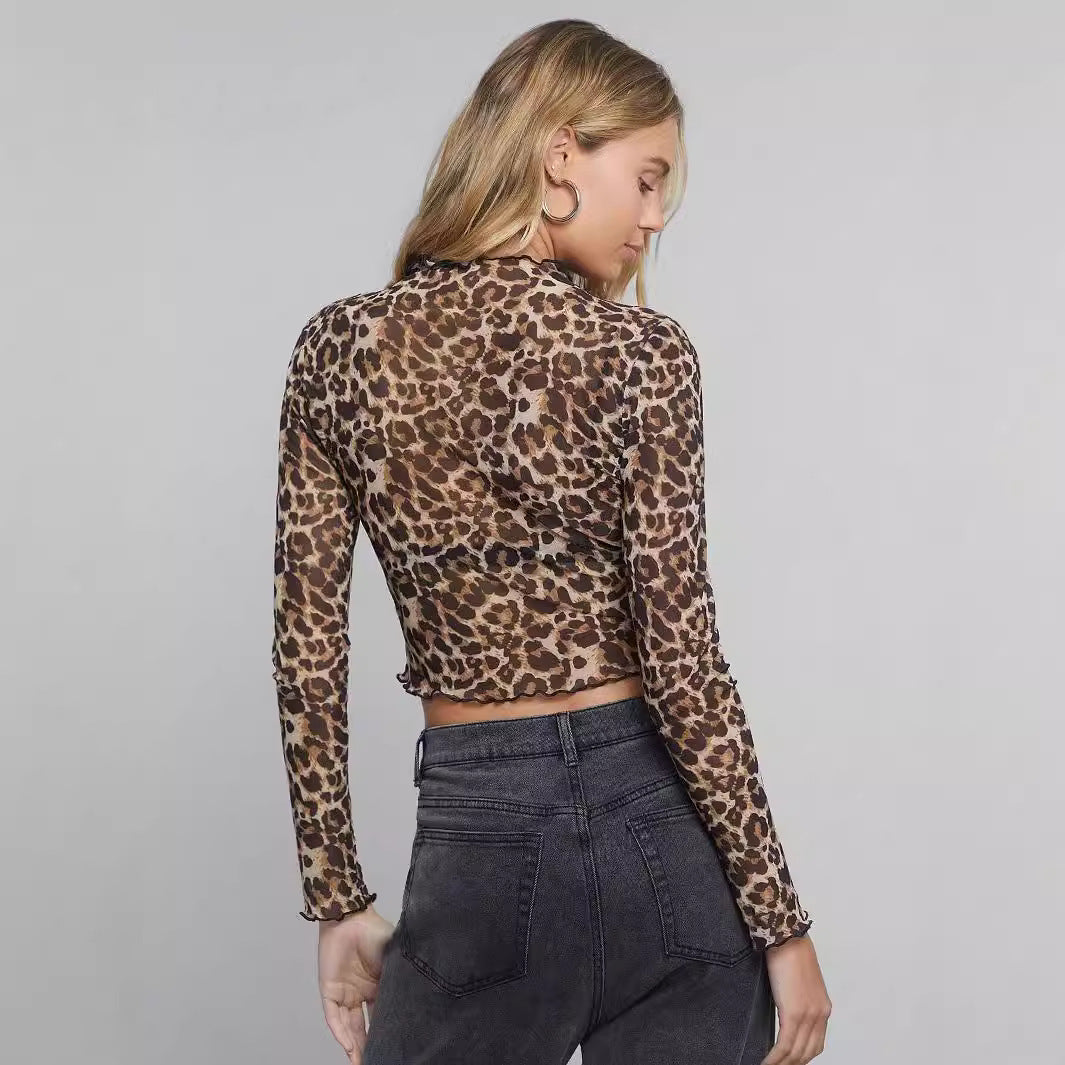 Damen nan figurbetontes bauchfreies Langarmshirt im Animalprint aus feinem Stretchnetz mit Stehkragen und Wellensaum Drune