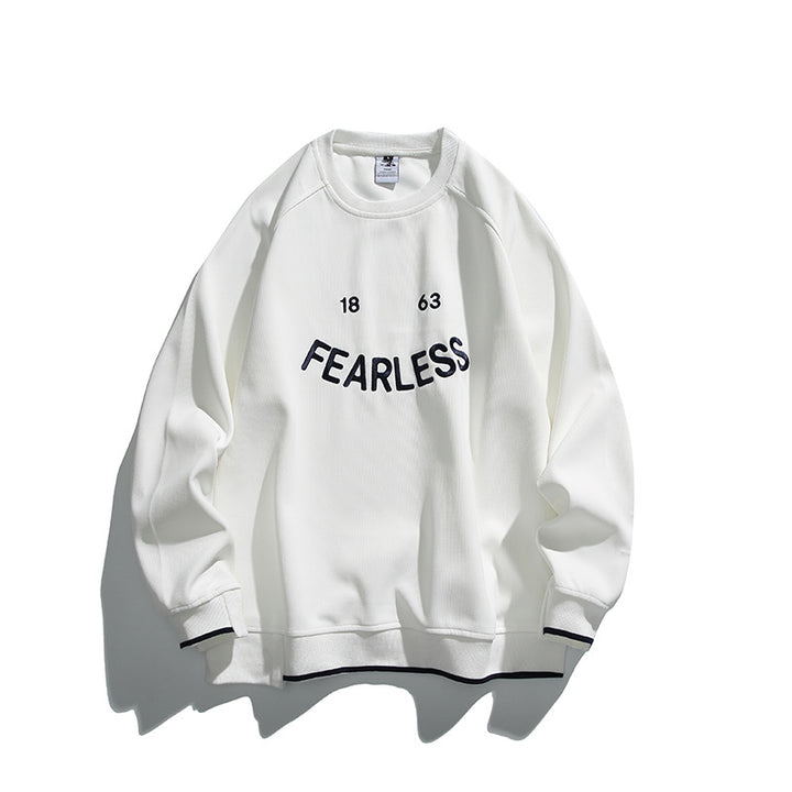 Unisex Oversize-Sweatshirt mit Raglanärmeln und markantem FEARLESS-Frontprint Drune