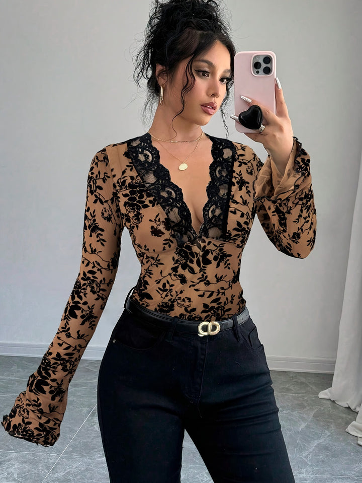 Damen nan eng anliegende transparente Mesh-Spitzenbluse mit tiefem V-Ausschnitt und floraler Veloursstruktur Drune