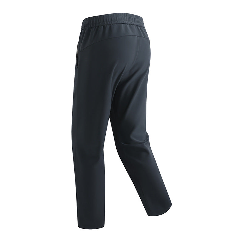 Herren Slim-Tapered Performance-Jogginghose aus wasserabweisendem Funktionsstoff mit elastischem Kordelbund & verdeckten Reißverschlusstaschen Drune