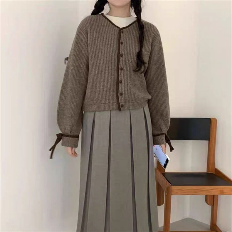 Damen Strickjacke mit kontrastierenden Ärmelabschlüssen und Knopfleiste Drune