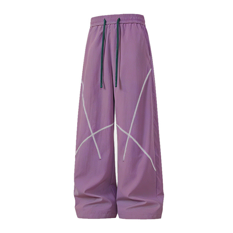 Herren Weite Funktions-Nylonhose mit Kordelbund, reflektierenden Nahtdetails & lässiger Baggy‑Silhouette Drune