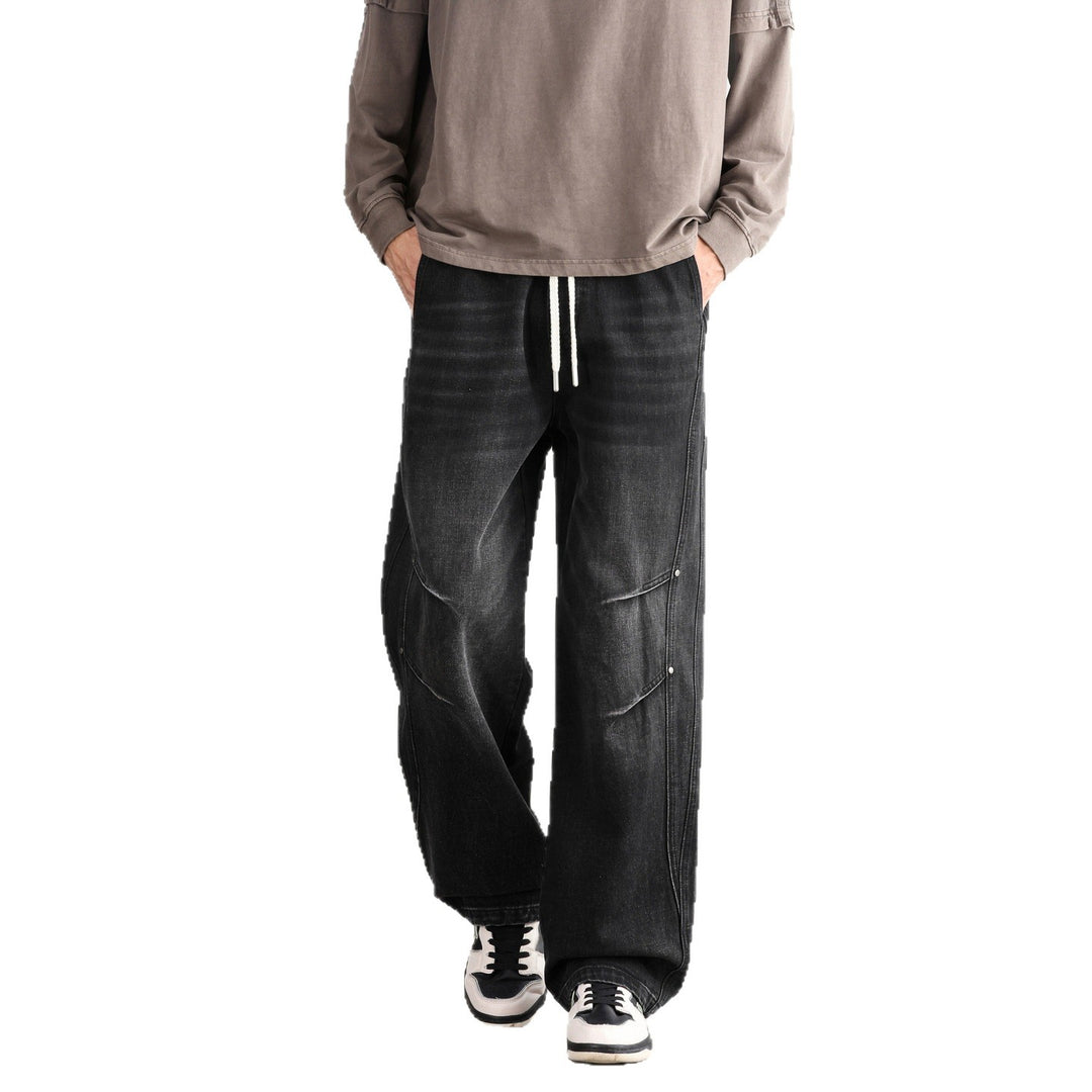 Herren Weite Denim-Hose mit Tunnelzugbund, Paneelnähten und Used-Waschung Drune