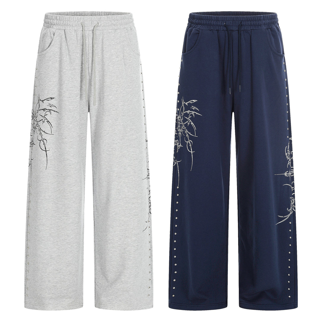 Damen Weite Sweatpants mit Tunnelzug, Ziernieten und grafischem Print Drune
