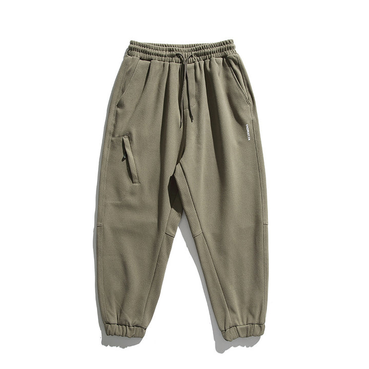 Unisex Weite Jogginghose im Oversize‑Cut mit elastischem Bund, Knie‑Paneel und gerippten Saumbündchen Drune