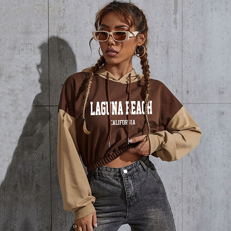 Damen Cropped Hoodie mit Kontrastärmeln, elastischem Saum und schmelzendem Smiley-Print Drune