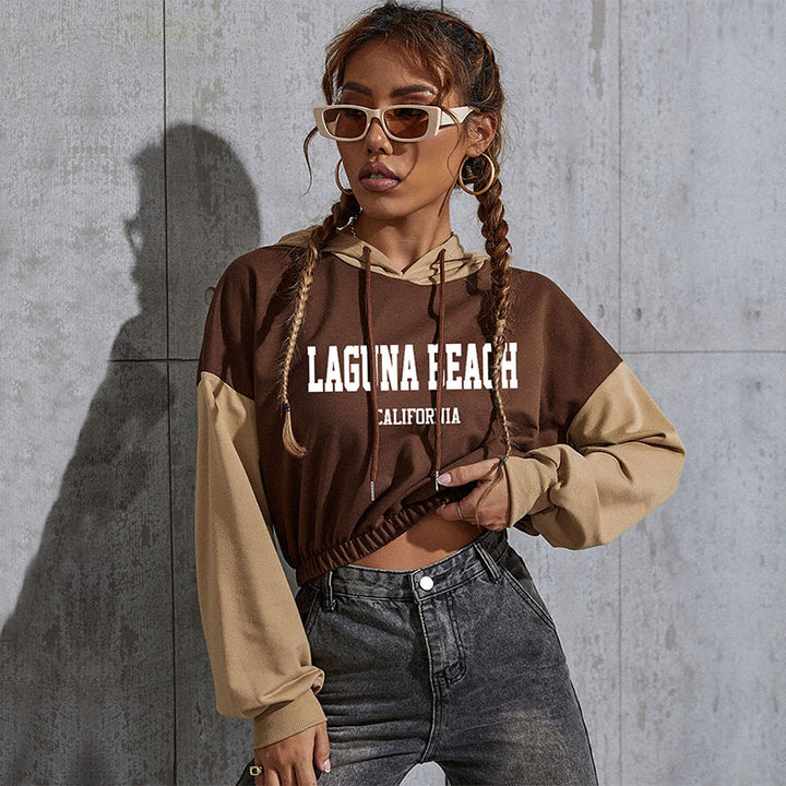 Damen Cropped Hoodie mit Kontrastärmeln, elastischem Saum und schmelzendem Smiley-Print Drune
