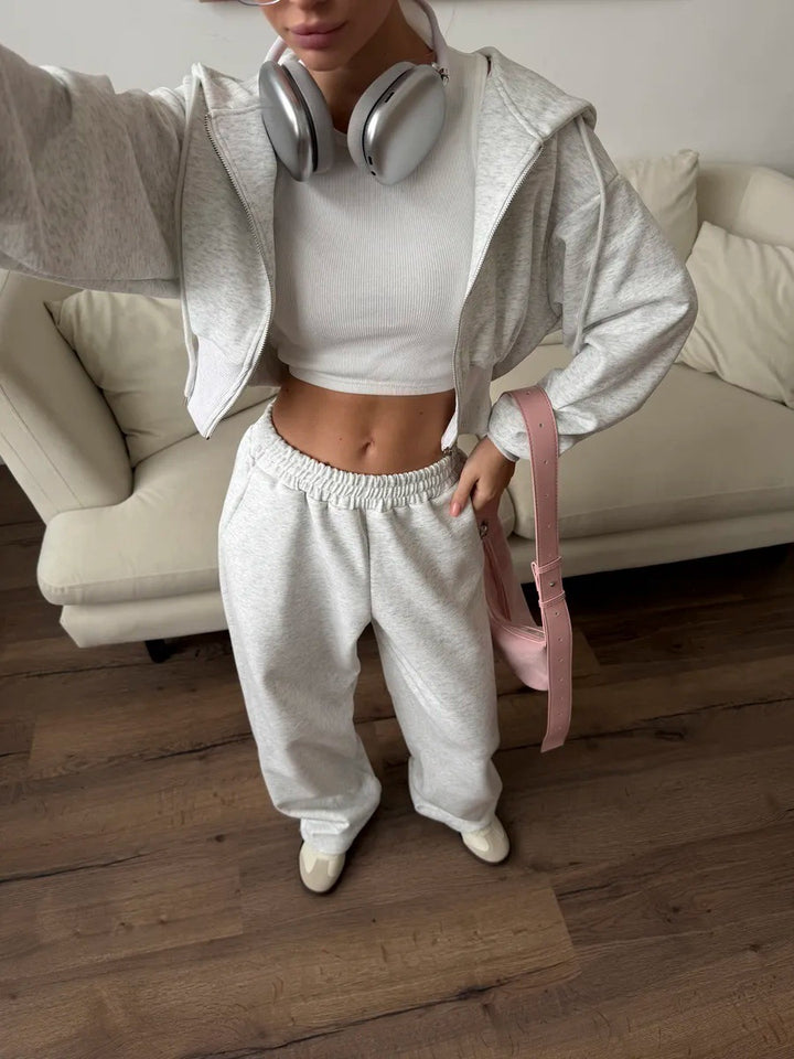 Damen gekürztes Reißverschluss-Hoodie mit Kapuze und hochgeschnittene Relax-Jogginghose mit elastischem Bund Drune