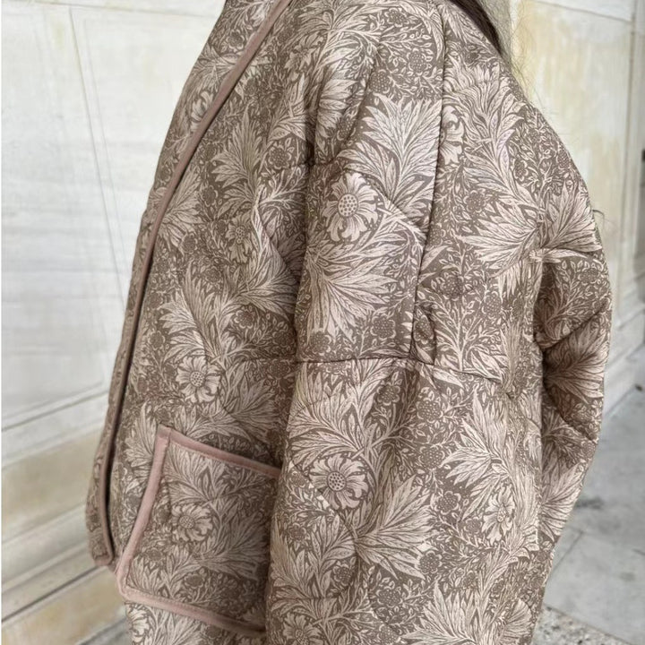 Damen Kurz geschnittene Steppjacke im Vintage-Blumenmuster mit Schalkragen und Kontrastpaspel Drune