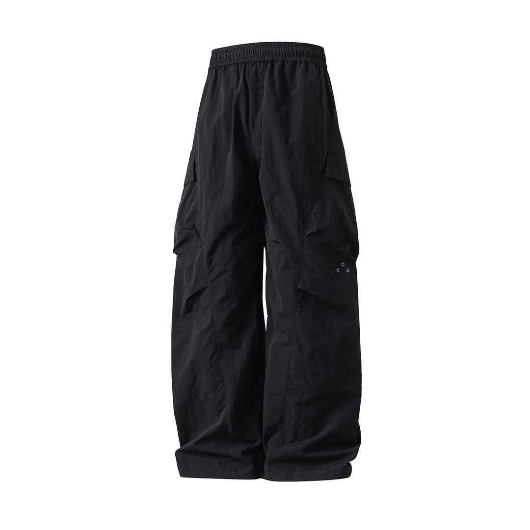 Unisex Weite Cargo‑Palazzo‑Hose aus technischer Crinkle‑Nylon mit elastischem Bund Drune