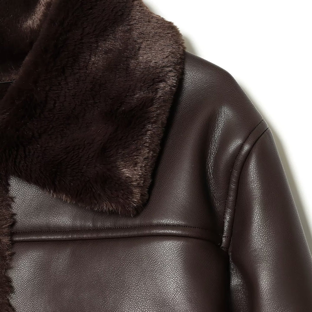 Damen Kurze wattierte Kunstlederjacke mit Teddy-Futter, Fellkragen und aufgesetzten Pattentaschen Drune