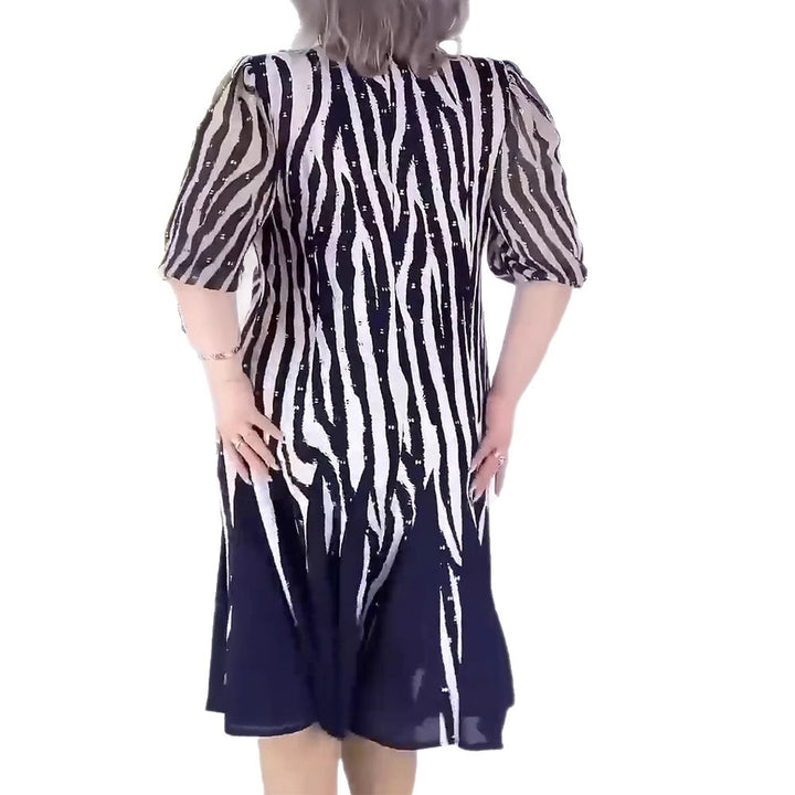 Damen nan tailliertes Midikleid mit grafischem Animalmuster, transparenten Puffärmeln und schwingendem Faltenrock Drune