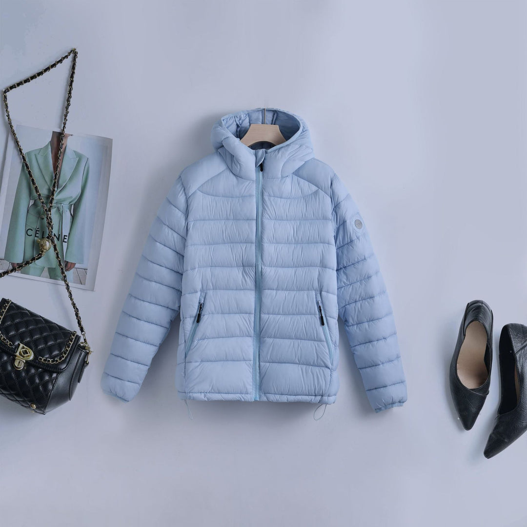Damen nan ultraleichte gesteppte Kapuzenjacke mit thermoisolierender Füllung und taillierbarem Tunnelzug Drune