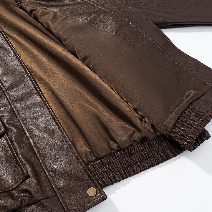 Damen nan kastige Kunstleder‑Fliegerjacke mit Hemdkragen, aufgesetzten Pattentaschen und elastischem Saum Drune