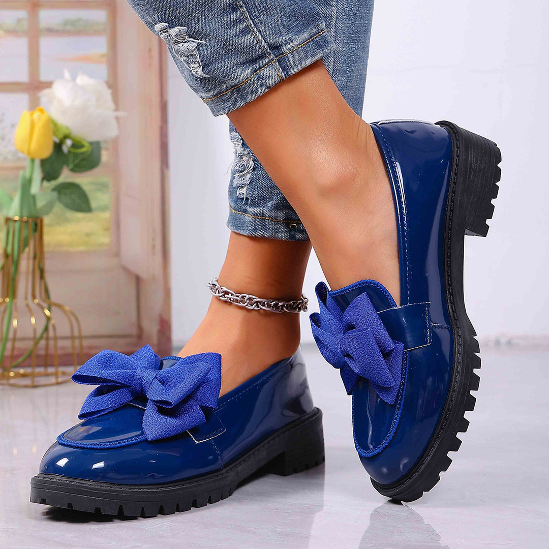 Damen Plateau-Loafer aus Lackimitat mit profilierter Gummisohle und Zierschleife Drune