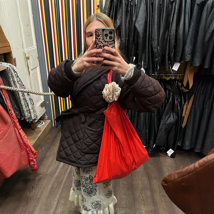 Damen Wickel-Steppjacke mit Taillenbindegürtel und Schalkragen Drune