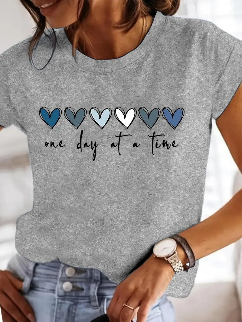 Damen Casual Grafik T-Shirt mit Herzdesign und inspirierendem Zitat Drune