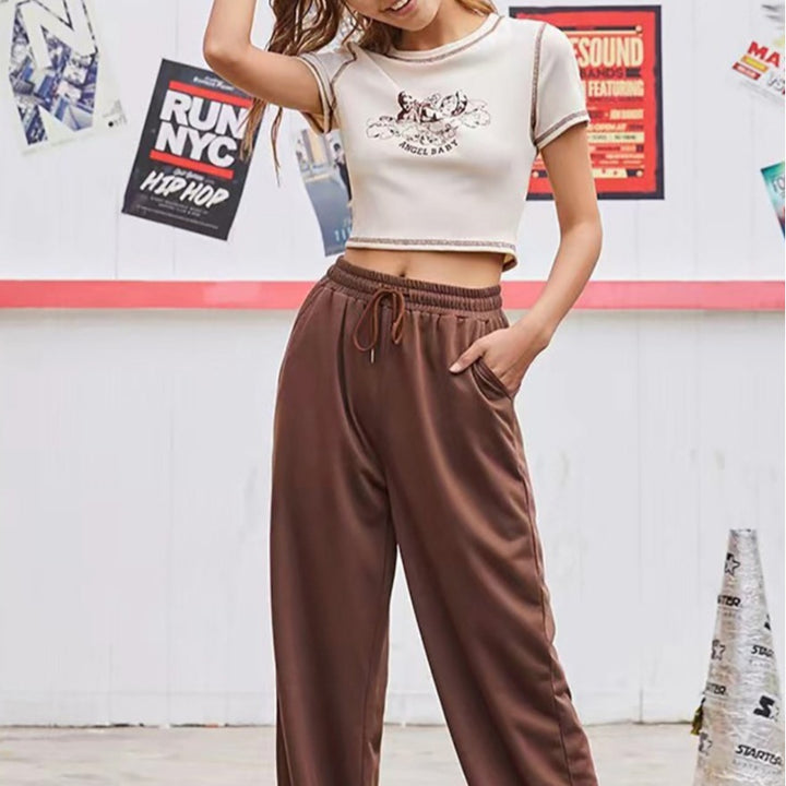 Damen Figurbetontes T-Shirt mit einzigartigem Engel-Motiv und modischem Print Drune