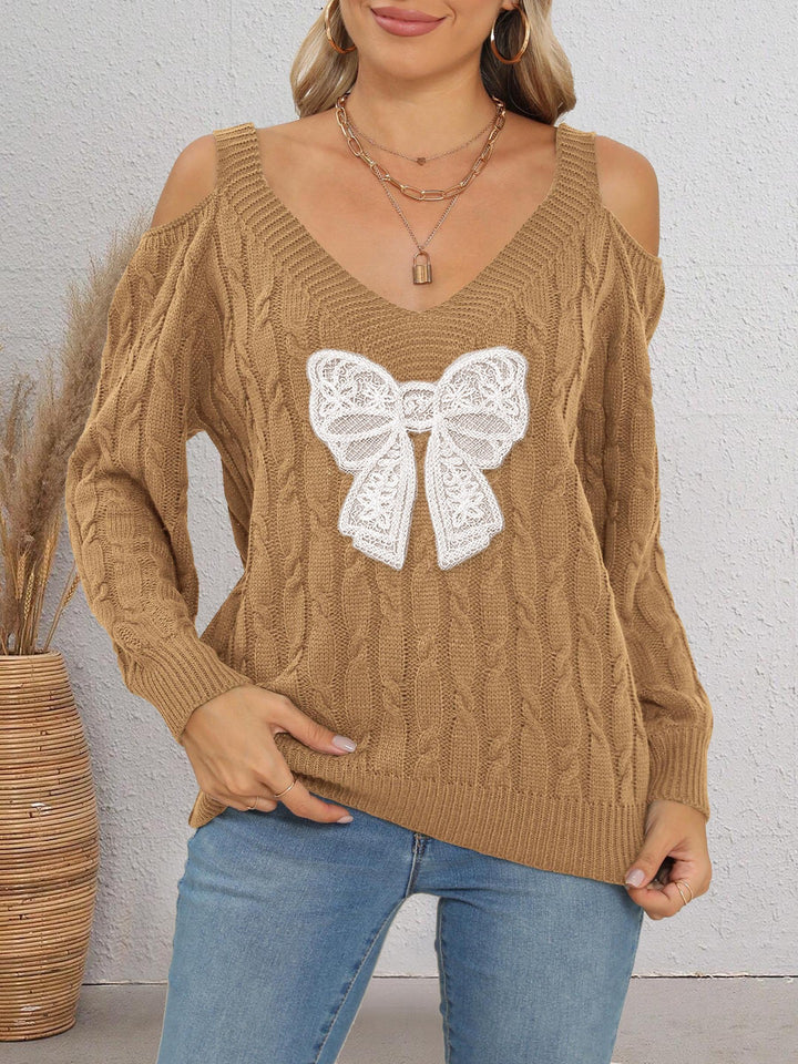 Damen modischer Pullover mit verspielt eingestricktem Schleifenmotiv Drune