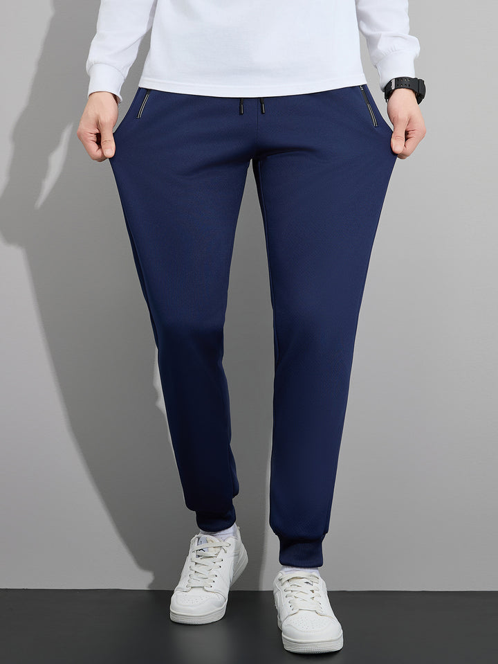 Herren Tapered Performance-Jogginghose mit elastischem Bund, Reißverschlusstaschen & gerippten Beinbündchen Drune