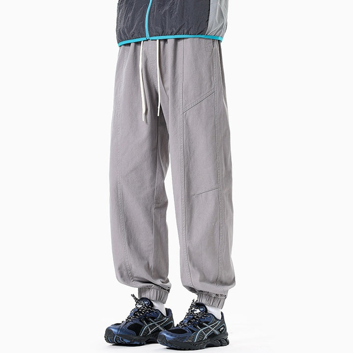 Herren Oversized Utility-Jogginghose aus robustem Baumwollmix mit Kordelbund, seitlichen Cargo‑Taschen & gerippten Bündchen Drune