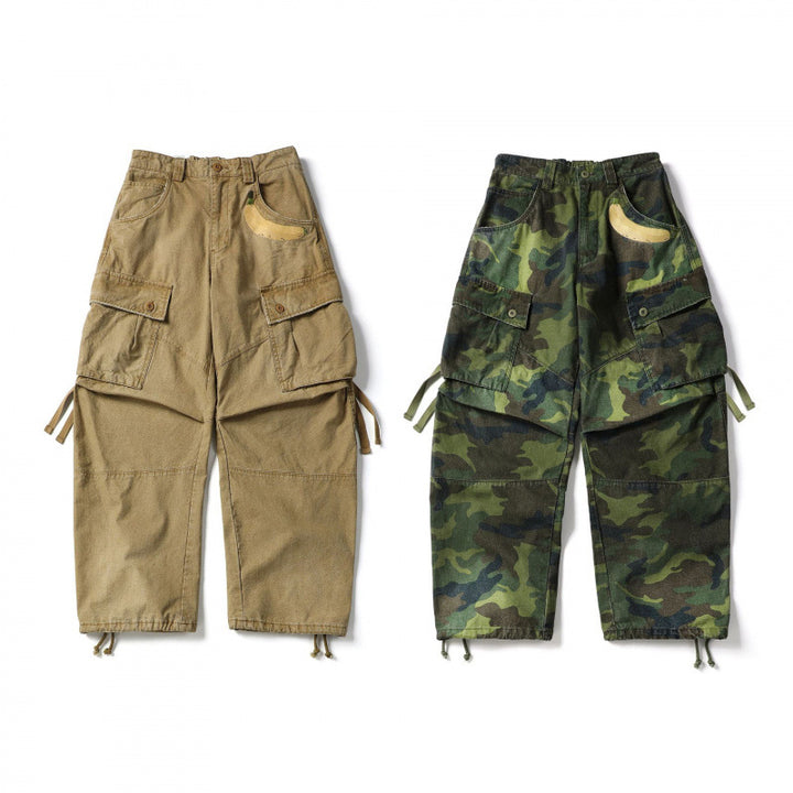 Unisex Locker geschnittene Cargo-Hose mit Bananen-Applikation, großen aufgesetzten Taschen und verstellbarem Saum Drune