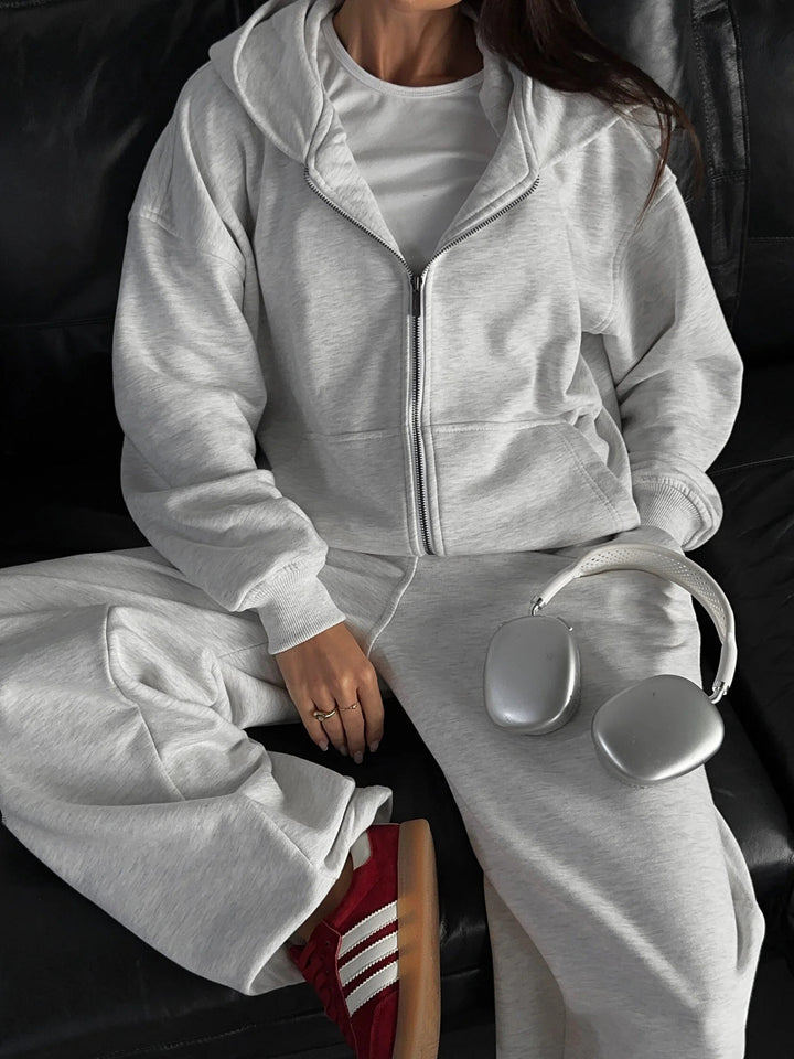 Damen lässiges Zip-Lounge-Set mit übergroßer Kapuzenjacke und taillierter Relax-Jogginghose Drune