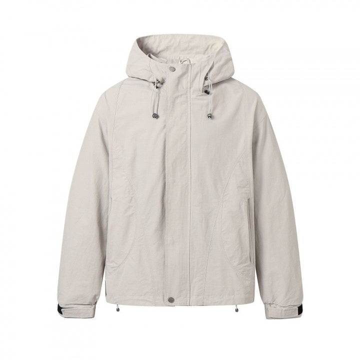 Unisex Kurz geschnittene Kapuzenjacke im technischen Outdoor‑Style mit Kordelzug, verdeckter Frontleiste und verstellbaren Bündchen Drune