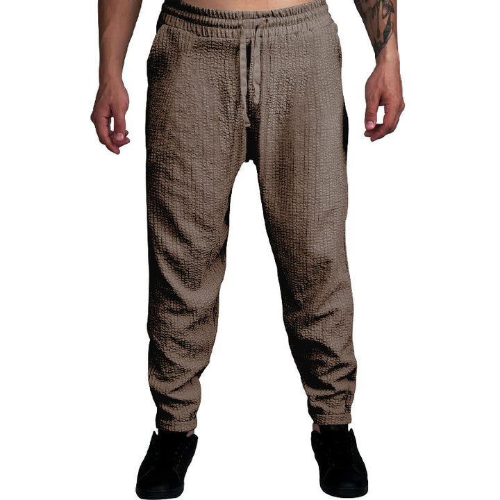 Herren Texturierte tapered Jogginghose mit Elastikbund, Tunnelzug & gerippten Knöchelbündchen Drune