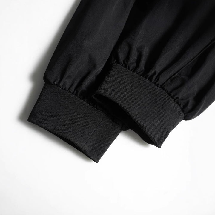 Herren Konisch geschnittene Utility‑Cargohose im Joggerstil mit Multifachtaschen, Kordelzug & elastischem Knöchelabschluss Drune