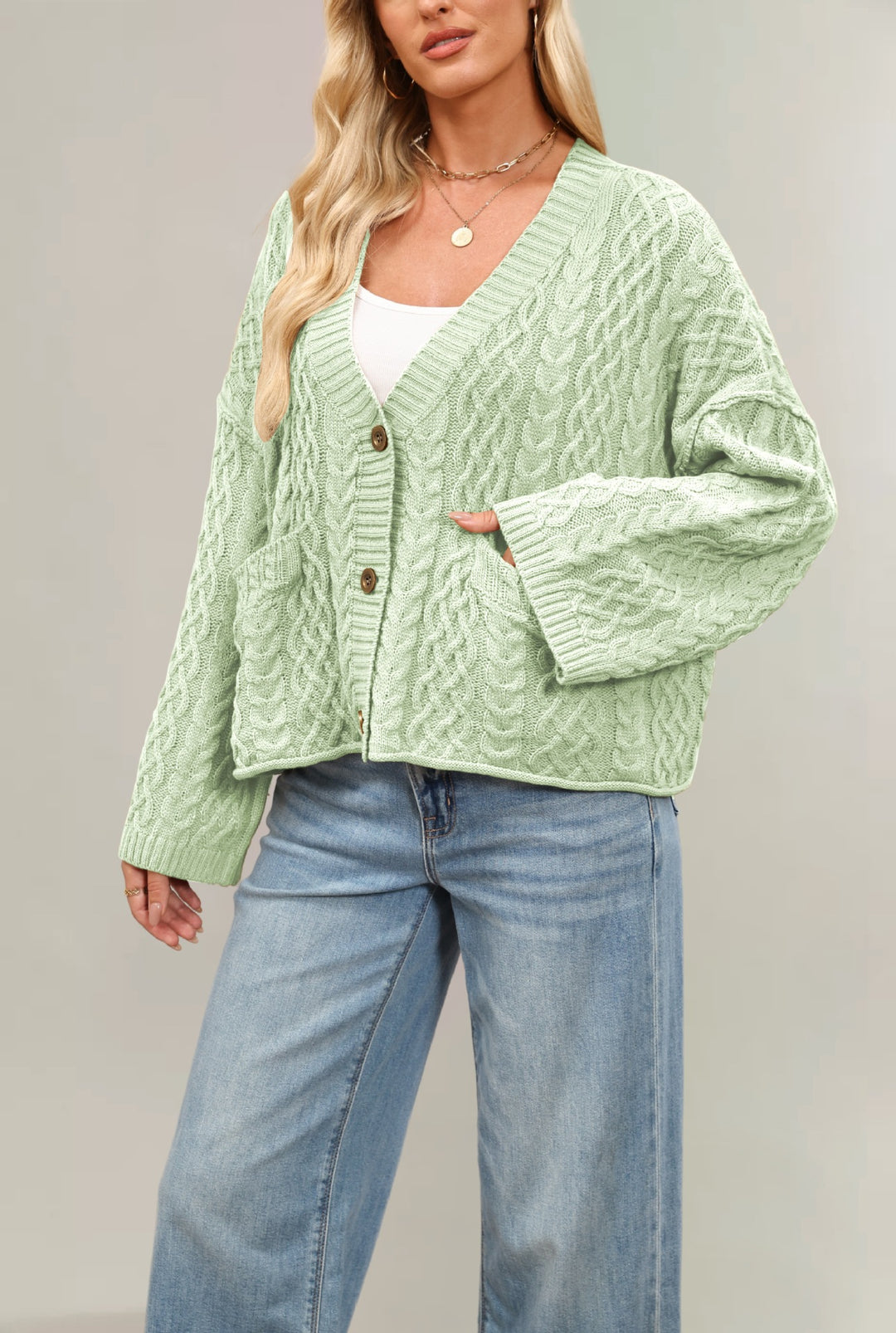 Damen Strickjacke mit Kabelmuster und Taschen Drune