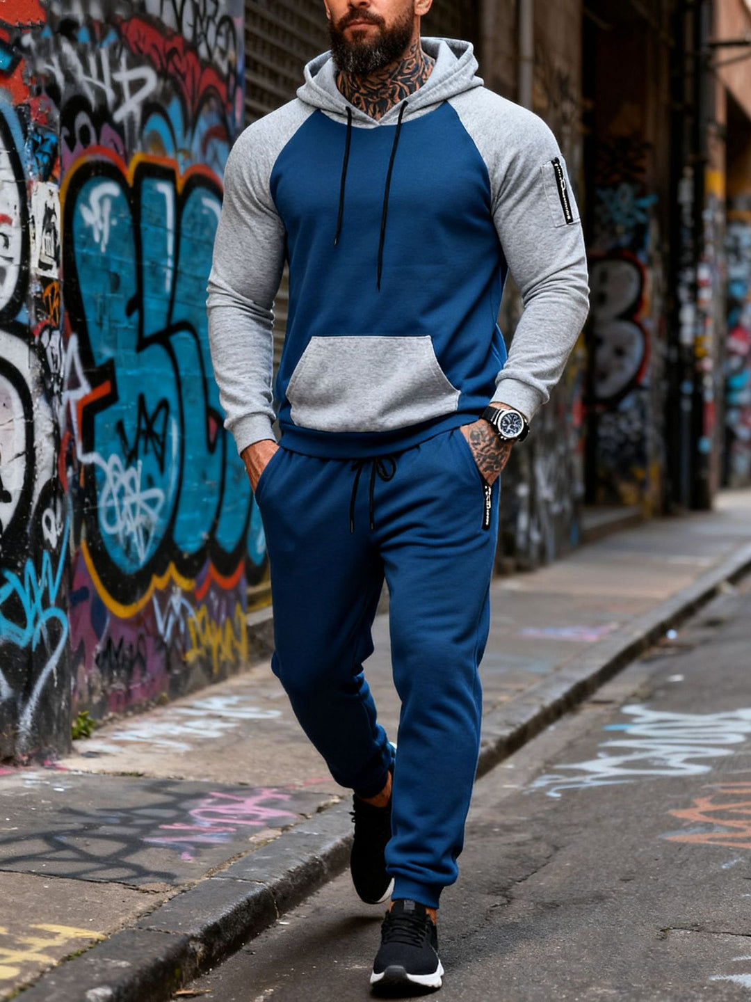 Herren nan zweiteiliges Kapuzen-Sweatset mit Raglanärmeln, Ärmel-Zip-Tasche und tapered Jogginghose Drune