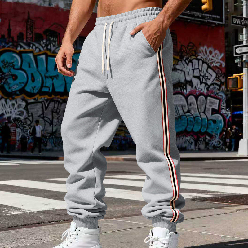 Herren Urbaner Slim-Jogger aus French Terry mit Seitenstreifen und gerippten Bündchen Drune