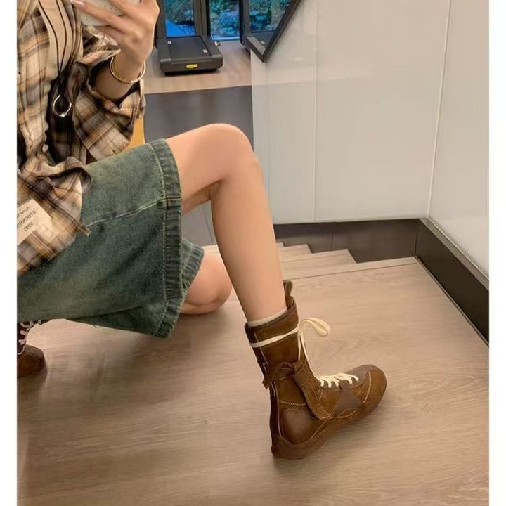 Damen Schnür-Ankleboots mit dekorativer Ziernaht, Riemenverschluss und markanter Profilsohle Drune