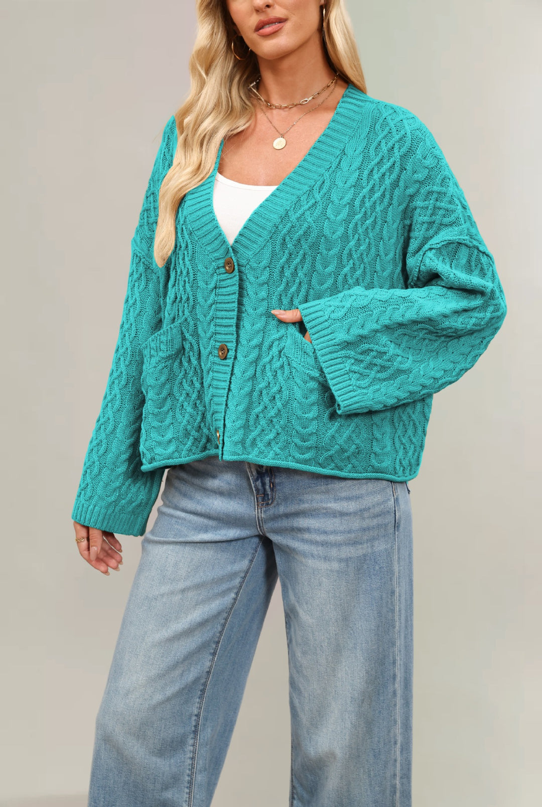 Damen Strickjacke mit Kabelmuster und Taschen Drune