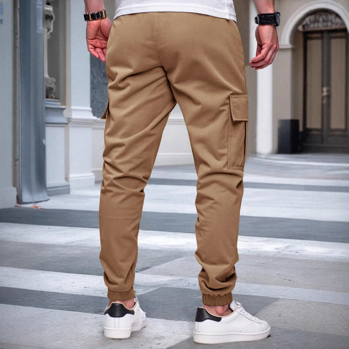 Herren nan tapered Freizeit-Cargohose mit aufgesetzten Klapptaschen, Tunnelzugbund und elastischen Beinabschlüssen Drune