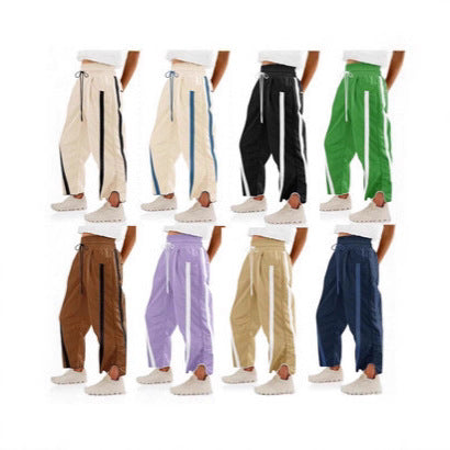 Damen nan relaxte Trackpants mit seitlichem Kontraststreifen, elastischem Smokbund und Eingrifftaschen Drune