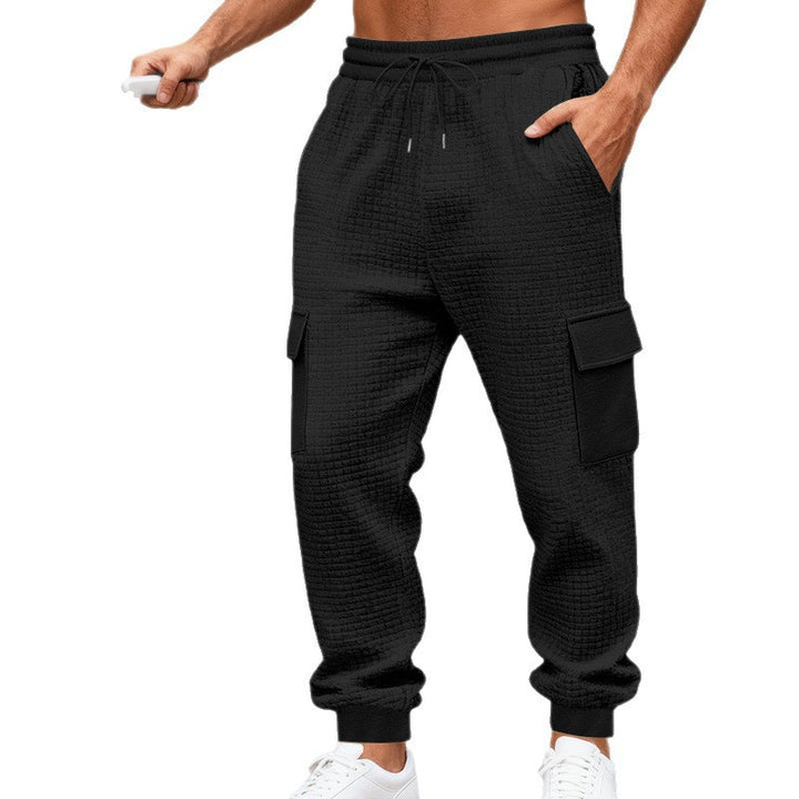 Herren Cargo-Jogginghose mit markanter Waffelstruktur, elastischem Bund und großen Klappentaschen Drune